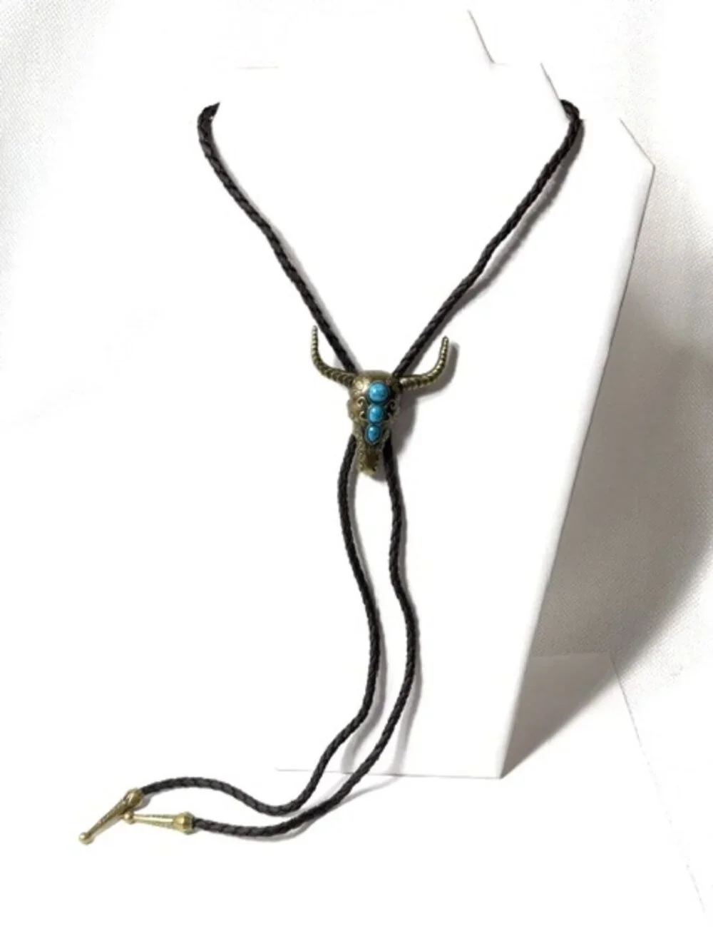 Gold-tone, turquoise-tone bull skull western cowboy bolo tie